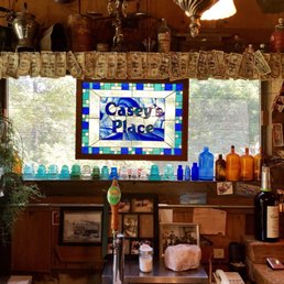 a kitchen with a large stained window