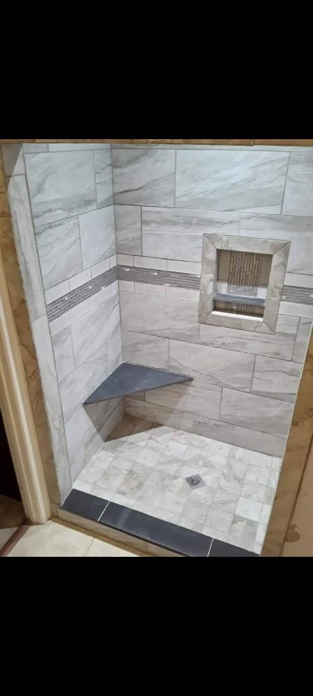 Slide of Bathmatic Custom Tile and Shower
