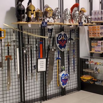 Pop Culture Collectibles - Roman and Gladiator Helmets and Swords - Comic Books Near Me - Plano, Texas Pop Culture Collectibles - Roman and Gladiator Helmets and Swords - Comic Books Near Me - Plano, Texas