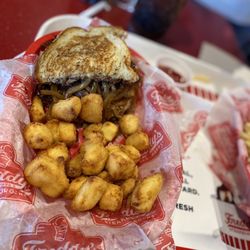 Freddy's Frozen Custard & Steakburgers - #4 Freddy's Original Patty Melt Combo, instead of Fries I got the cheese curds. Pretty good, a little too salty for me.