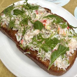 Crab Toast w/crab salad, yuzu & herbs atop toasted sourdough