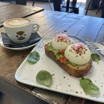 Mika's - Cappuccino and poached egg avocado toast. - Cafes Near Me - San Marcos, California Mika's - Cappuccino and poached egg avocado toast. - Cafes Near Me - San Marcos, California