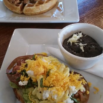 Adair Kitchen - Avocado Mash with scrambled eggs and Cheddar. Chicken and waffles - New American Near Me - Houston, Texas Adair Kitchen - Avocado Mash with scrambled eggs and Cheddar. Chicken and waffles - New American Near Me - Houston, Texas