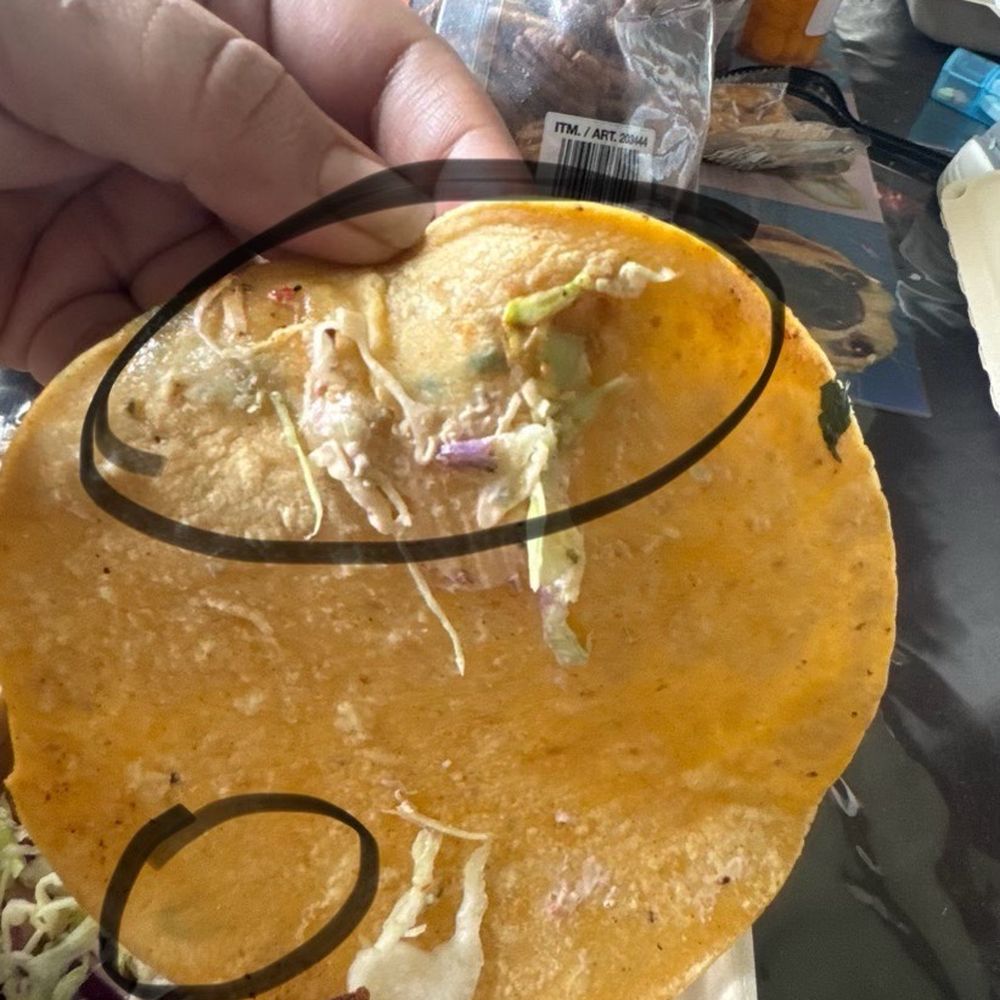 Mold on my tortilla-  you can't tell see it more clearly in person