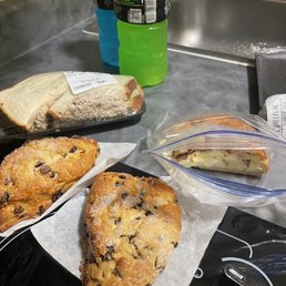 a variety of pastries on a counter a variety of pastries on a counter