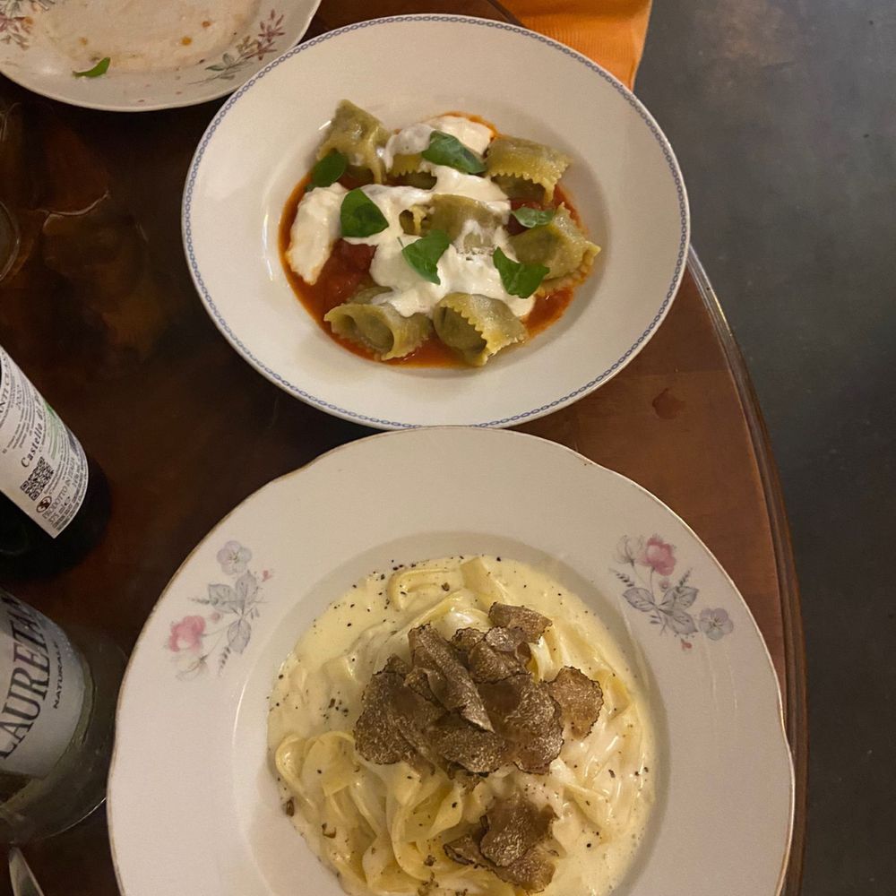 Osteria Pastella - Smoked eggplant tortelli and tagliatelle with truffle in a cheese wheel! - Tuscan Near Me - Florence, FI Osteria Pastella - Smoked eggplant tortelli and tagliatelle with truffle in a cheese wheel! - Tuscan Near Me - Florence, FI