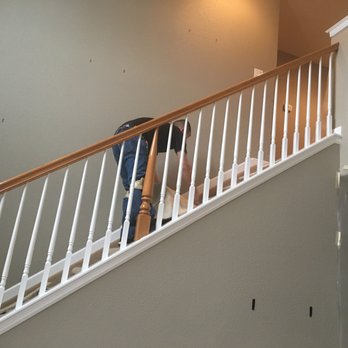 PSI Wood Floors - a man standing on a staircase - Flooring Near Me - Thornton, Colorado PSI Wood Floors - a man standing on a staircase - Flooring Near Me - Thornton, Colorado