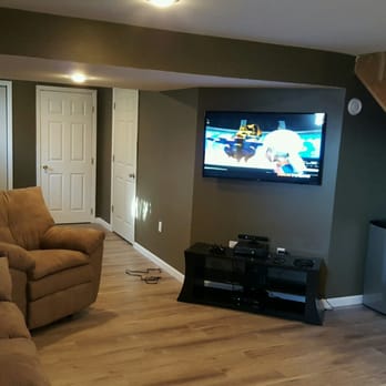 Horton's Construction - a living room with a flat screen tv - General Contractors Near Me - Easton, Pennsylvania Horton's Construction - a living room with a flat screen tv - General Contractors Near Me - Easton, Pennsylvania