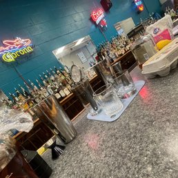 Learning craft whiskey sours, taught by Santiago!