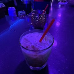 Moscow mule and a white Russian. Tasty cocktails Moscow mule and a white Russian. Tasty cocktails