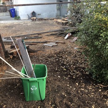 Edy Miranda Landscaping - Before photo showing broken down fence facing out to the neighbors yard. - Landscaping Near Me