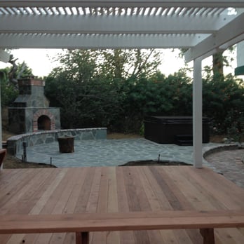 Werth Builders - Backyard patio deck, cover, flagstone patio, brick walkway, fireplace, seating wall and spa - General Contractors Near Me - Huntington Beach, California Werth Builders - Backyard patio deck, cover, flagstone patio, brick walkway, fireplace, seating wall and spa - General Contractors Near Me - Huntington Beach, California