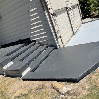 Mondi Construction - New concrete stairs after poured and stained - General Contractors Near Me