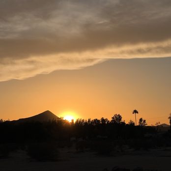 Barstow Calico Koa - the sun setting over a mountain - Convenience Stores Near Me - Yermo, California