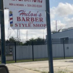 Hulon's Barber & Style Shop - Sign outside