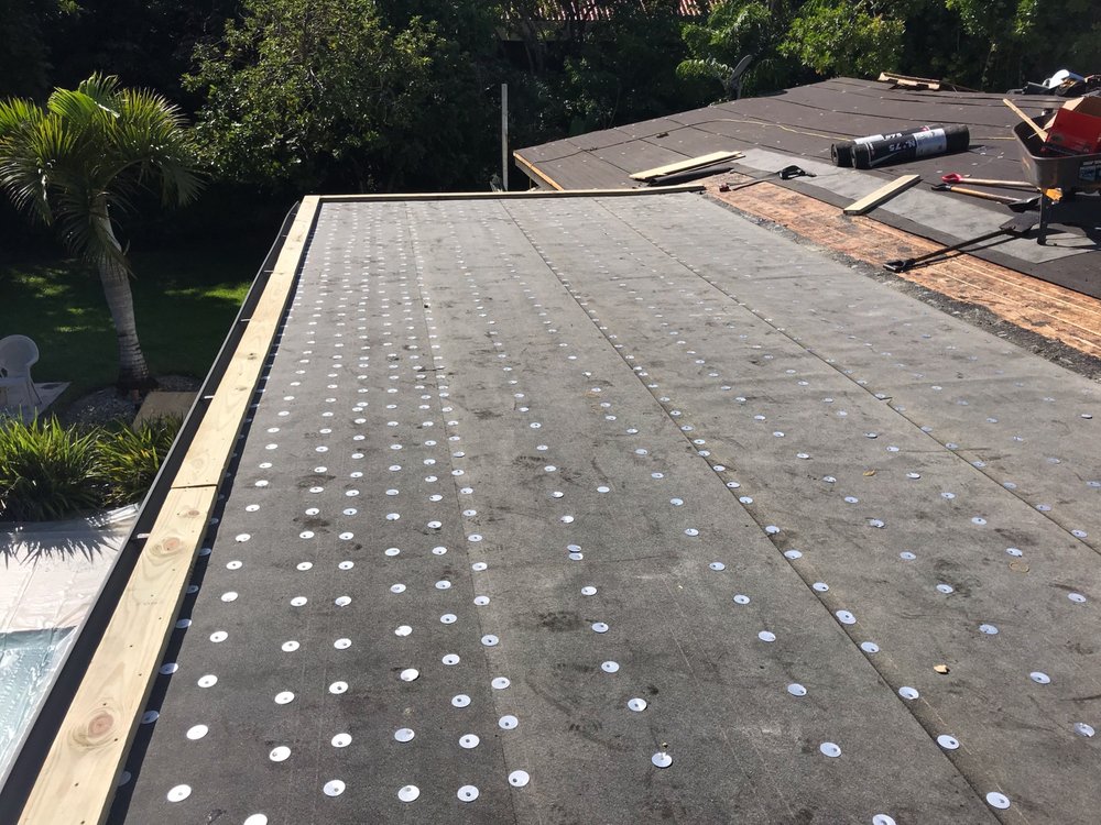 Slide of D-Tech Roofing