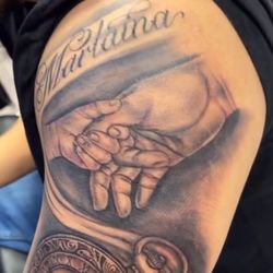 Father Stone tattoo with pocket watch