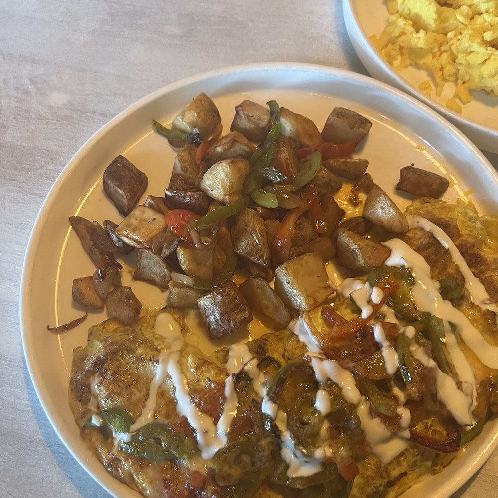Toast Kitchen & Bar - Spanish Omelette- wish it had regular cheese not that cream - Breakfast & Brunch Near Me - Brea, California Toast Kitchen & Bar - Spanish Omelette- wish it had regular cheese not that cream - Breakfast & Brunch Near Me - Brea, California