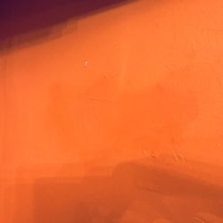 Sherwin-Williams Paint Store - Knockout Orange? 3 gallons of paint on the wall, and all 3 are different colors. I don't know how to remedy this...