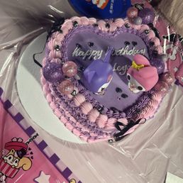 The cake with my added cake toppers