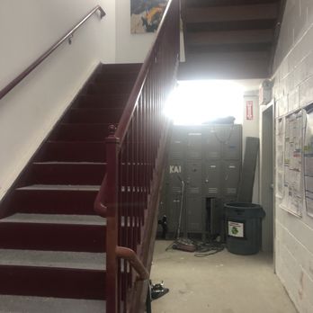 MetroRock - Brooklyn - Stairs to your right once you enter the climbing grounds will take you to the upstairs area where the gym and yoga studio are at - Rock Climbing Near Me - Brooklyn, New York