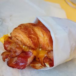 Sunrise Donut - Bacon, egg, & cheese breakfast croissant