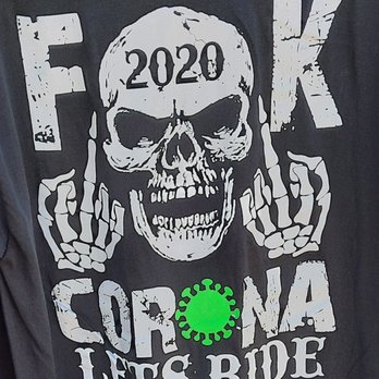 Boot Hill Saloon - a t - shirt with a skull on it - Dive Bars Near Me - Daytona Beach, Florida