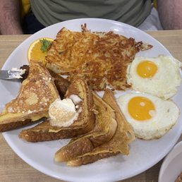 The Sampler: includes French toast, hash browns, eggs and substituted bacon with sausage links The Sampler: includes French toast, hash browns, eggs and substituted bacon with sausage links