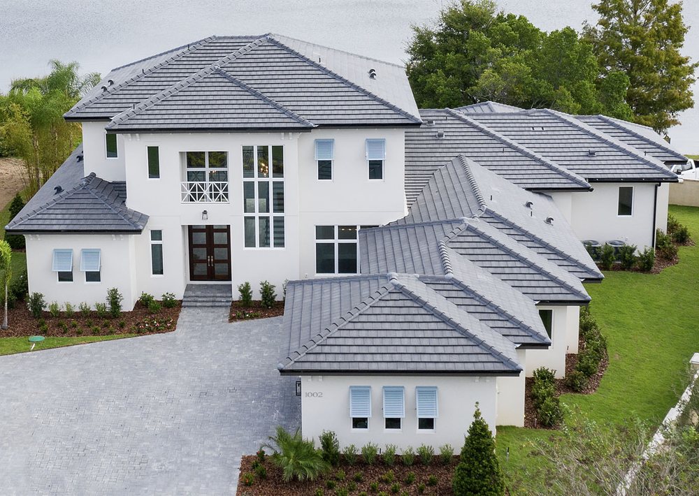 Slide of Reliant Roofers and Restoration