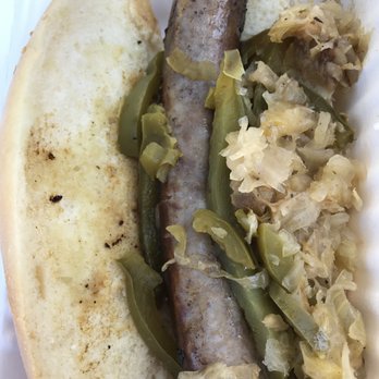 The Wurst - Sheboygan Brat with sauerkraut and sweet peppers at The Wurst Restaurant in downtown Healdsburg. - Caterers Near Me The Wurst - Sheboygan Brat with sauerkraut and sweet peppers at The Wurst Restaurant in downtown Healdsburg. - Caterers Near Me