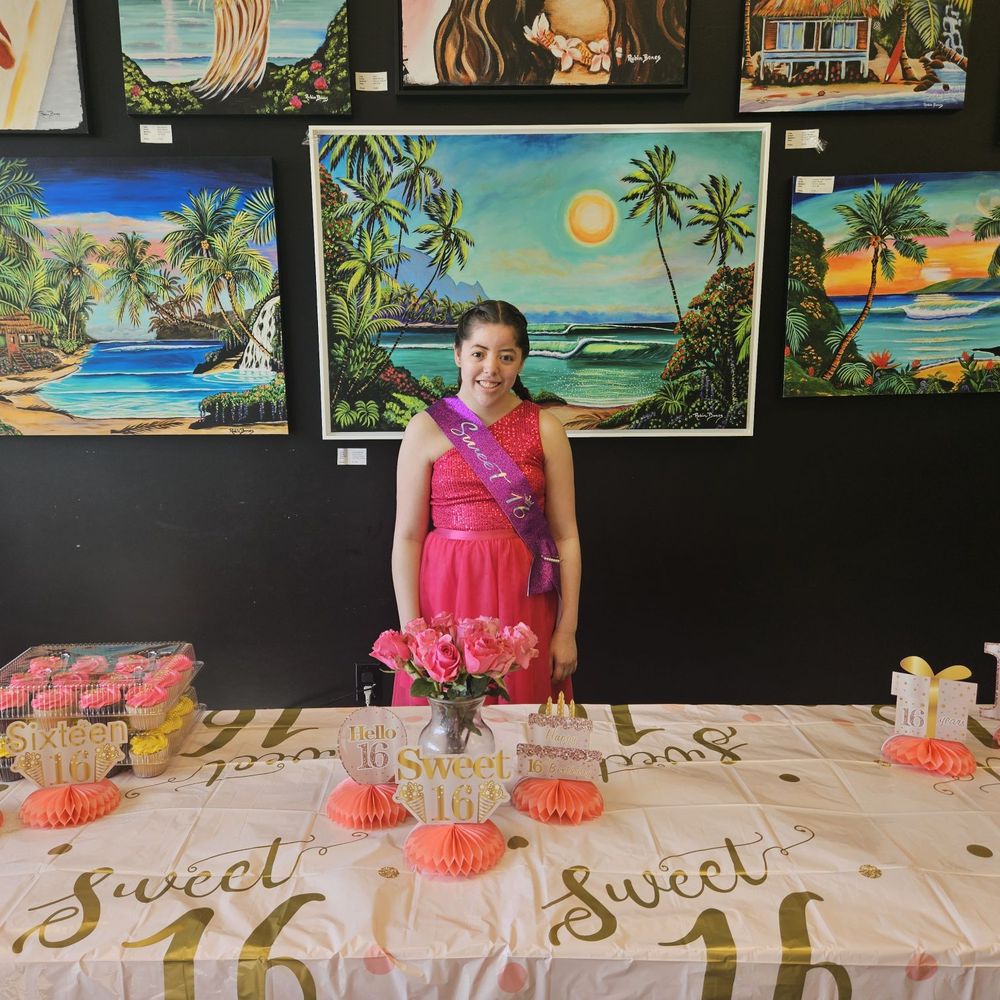 Arches Art Adventures - Our birthday girl at her table, in front of beautiful artwork. - Art Classes Near Me - Coconut Creek, Florida
