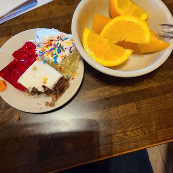 Hacienda Vallarta - Thres Leches cake with sprinkles, carrot cake & red jello. Orange slices & cantaloupe - Mexican Near Me - San Antonio, Texas Hacienda Vallarta - Thres Leches cake with sprinkles, carrot cake & red jello. Orange slices & cantaloupe - Mexican Near Me - San Antonio, Texas