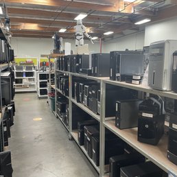 One of several aisles of workstations. Cool memorabilia inside as well.
