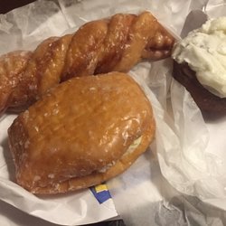 Granny's Bakery & Sub Shop - Orange twist (top left), Bavarian creme (front) and pumpkin donut with cream cheese.