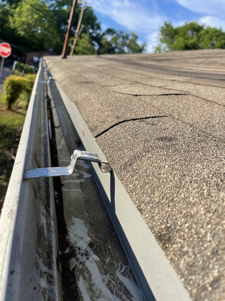 Slide of Marcus Gutters Cleaning