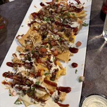 Main Street Romeo Kitchen + Bar - BBQ Bulldog Nachos - New American Near Me - Romeo, Michigan Main Street Romeo Kitchen + Bar - BBQ Bulldog Nachos - New American Near Me - Romeo, Michigan