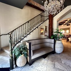 Staircase to the Atrium our private dining room located on second floor.
