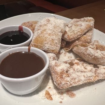 Olive Garden Italian Restaurant - Dessert Donuts with both raspberry and chocolate on the size - Italian Near Me - Clovis, California Olive Garden Italian Restaurant - Dessert Donuts with both raspberry and chocolate on the size - Italian Near Me - Clovis, California