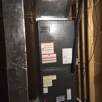 Comfortable Design - a furnace in a basement - Heating & Air Conditioning/HVAC Near Me - Wrightsville, Pennsylvania
