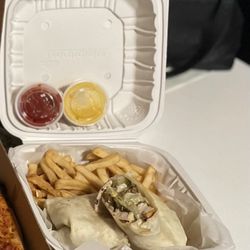 Brooklyn Pizza - Grilled chicken Caesar wrap w/ fries always delicious .
