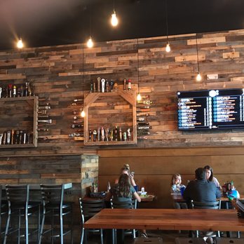 Pour Kitchen & Bar - Cool decor - taps on display! - Wine Bars Near Me - Petoskey, Michigan