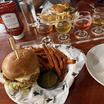 Resurgence Brewing - Honey Chipotle chicken sandwich with sweet potato fries and honey butter - Breweries Near Me - Buffalo, New York Resurgence Brewing - Honey Chipotle chicken sandwich with sweet potato fries and honey butter - Breweries Near Me - Buffalo, New York