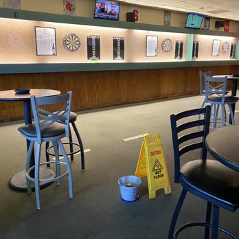 Rock Falls Tavern - a wet floor with a caution sign - Sports Bars Near Me - Richmond, Virginia Rock Falls Tavern - a wet floor with a caution sign - Sports Bars Near Me - Richmond, Virginia