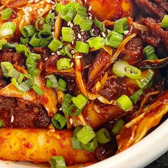 Kogi - Spicy rice cakes - pork belly was a nice touch! - Korean Near Me - Richmond, Virginia