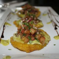 Tapas Italiano - Crispy Tostones Fig Glaze bruschetta over Avocado Lime Cilantro Creme
