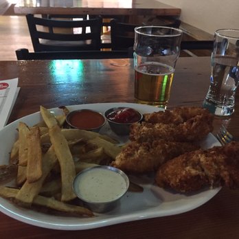 Tap and Handle - Beer-battered chicken fingers with plank fries. - Beer, Wine & Spirits Near Me - Fort Collins, Colorado Tap and Handle - Beer-battered chicken fingers with plank fries. - Beer, Wine & Spirits Near Me - Fort Collins, Colorado