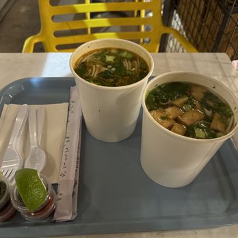Pho Kup - Rice Noodle Pho with veggie broth and tofu (right)  Egg Noodle Pho with beef broth and chicken (left) - Vietnamese Near Me - Albuquerque, New Mexico