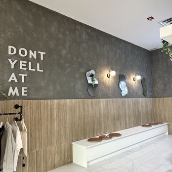 Don’t Yell At Me - a white bench in front of a wall - Bubble Tea Near Me - Calgary, Alberta Don’t Yell At Me - a white bench in front of a wall - Bubble Tea Near Me - Calgary, Alberta