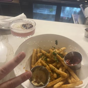 Lost Never Found - Parmesan fries(it's served with three sauces, I just skip the chili aioli personally) and the 9 to "7" 5 cocktail. - Bars Near Me - Chicago, Illinois