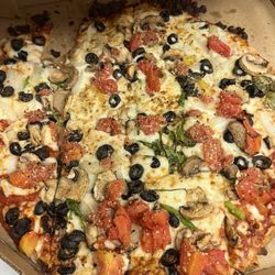 Domino's Pizza - 02/01/2026 spinach, mushroom, tomatoes, black olives & onions on thin crust.